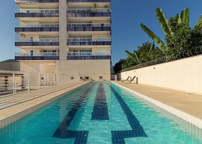 Apartamento alto padrão com 3 suítes, sala 3 ambientes todos com ar, ambientes novos e moderno. Ubatuba